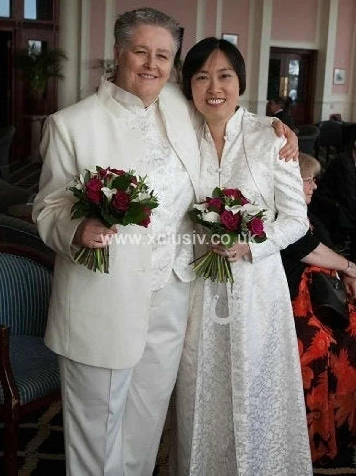 Two brides in bespoke ivory suit and brocade coat-dress – XCLUSIV Horsham Main image