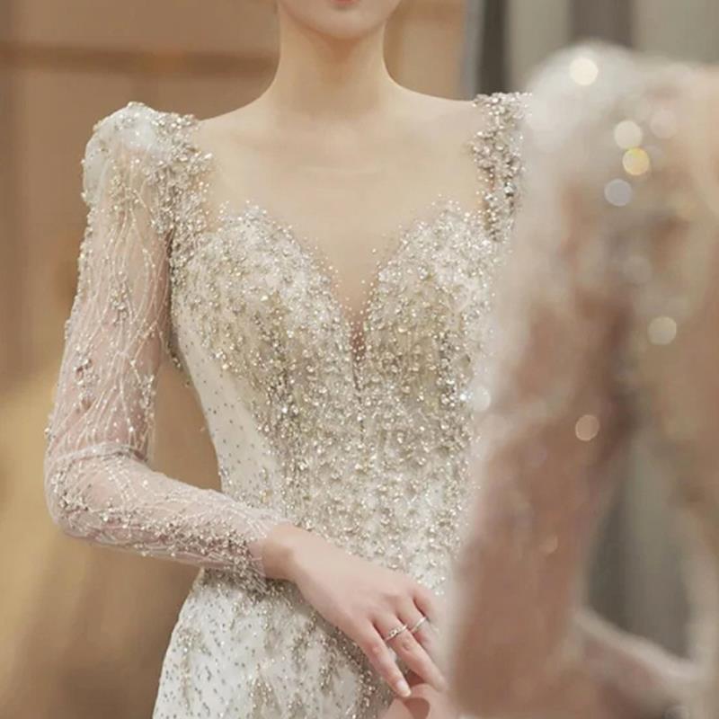 Elegant Beaded Mermaid Wedding Dress with Long Illusion Sleeves and Dramatic Open Back Secondary image