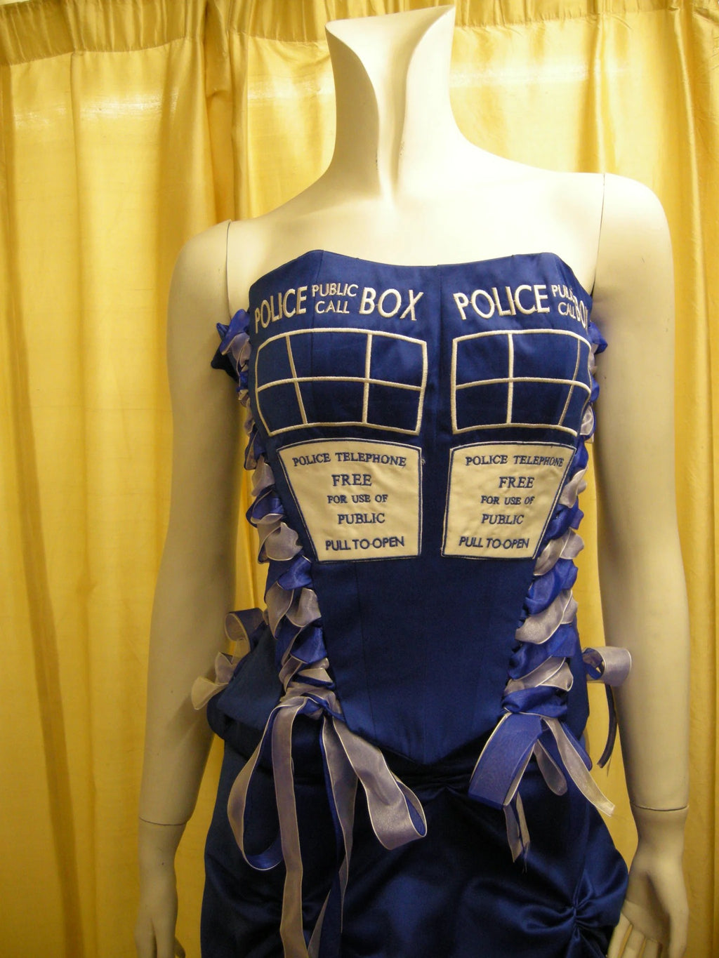 Blue satin police box gown on mannequin – XCLUSIV Horsham