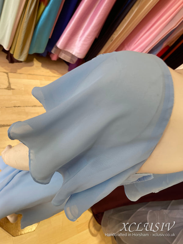 Cornflower Blue Chiffon Cape-Sleeve Tea-Length Dress – Mother of the Bride – XCLUSIV Horsham (view 7)