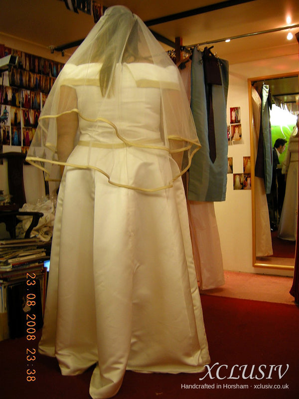 Ivory Satin Off-Shoulder Wedding Dress with Gold Trim – XCLUSIV Horsham