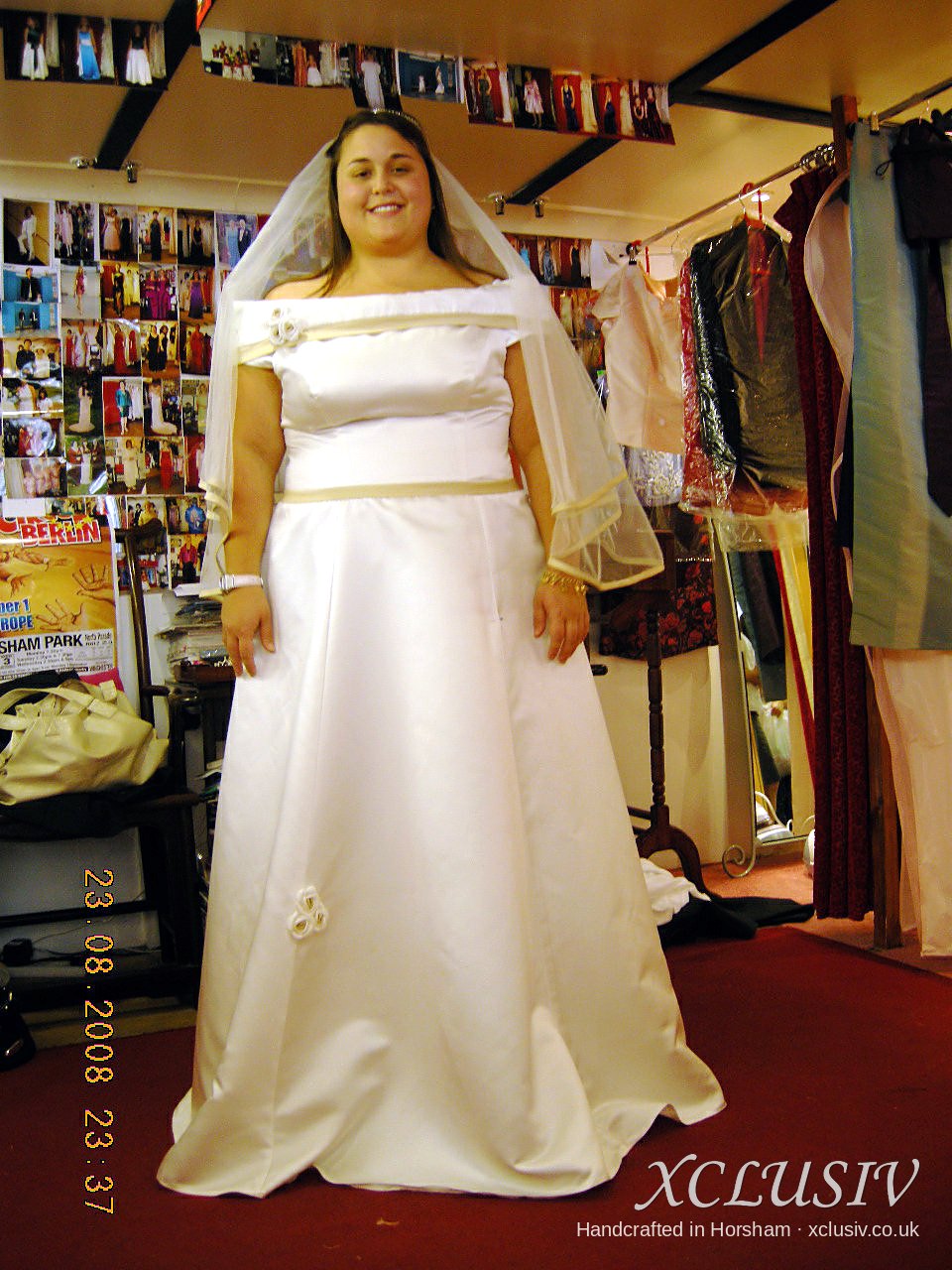 Ivory Satin Off-Shoulder Wedding Dress with Gold Trim – XCLUSIV Horsham (view 2)