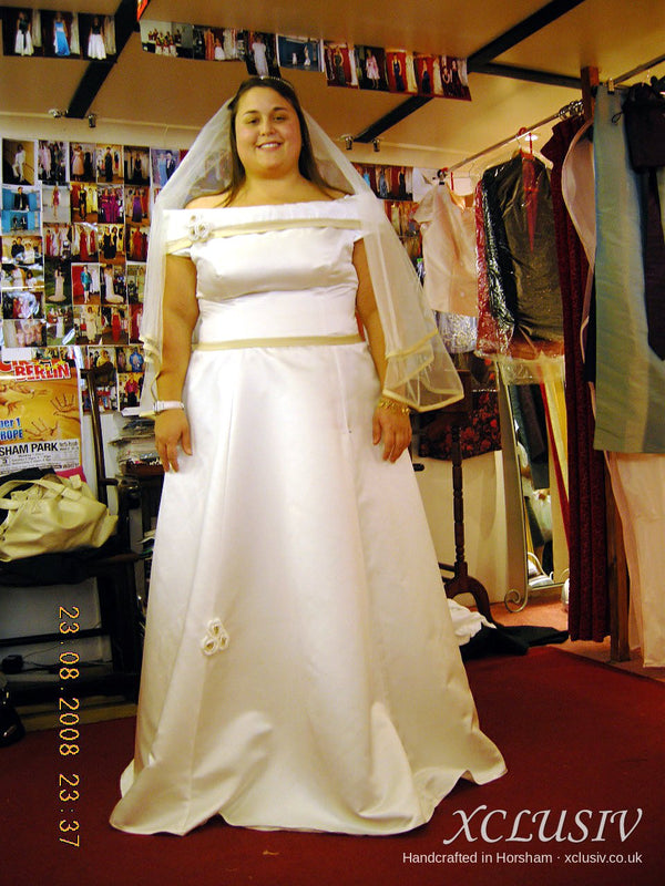 Ivory Satin Off-Shoulder Wedding Dress with Gold Trim – XCLUSIV Horsham (view 2)