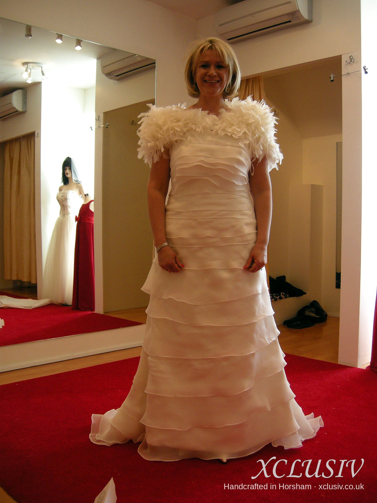 Ivory Tiered Organza Wedding Dress with Feather Wrap – XCLUSIV Horsham (view 2)