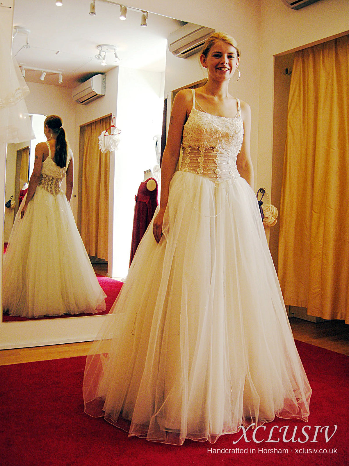 Ivory Tulle Ball Gown Wedding Dress with Gold Corset Bodice – XCLUSIV Horsham