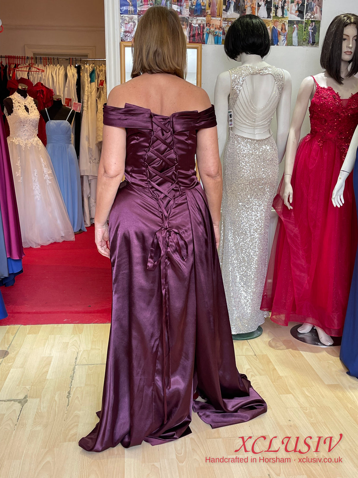 Plum Satin Off-Shoulder Gown with Draped Train – Mother of the Bride – XCLUSIV Horsham Main image